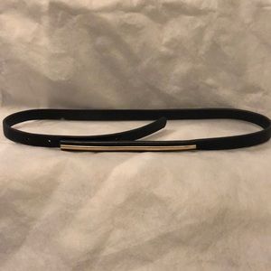 Black and gold accessory belt